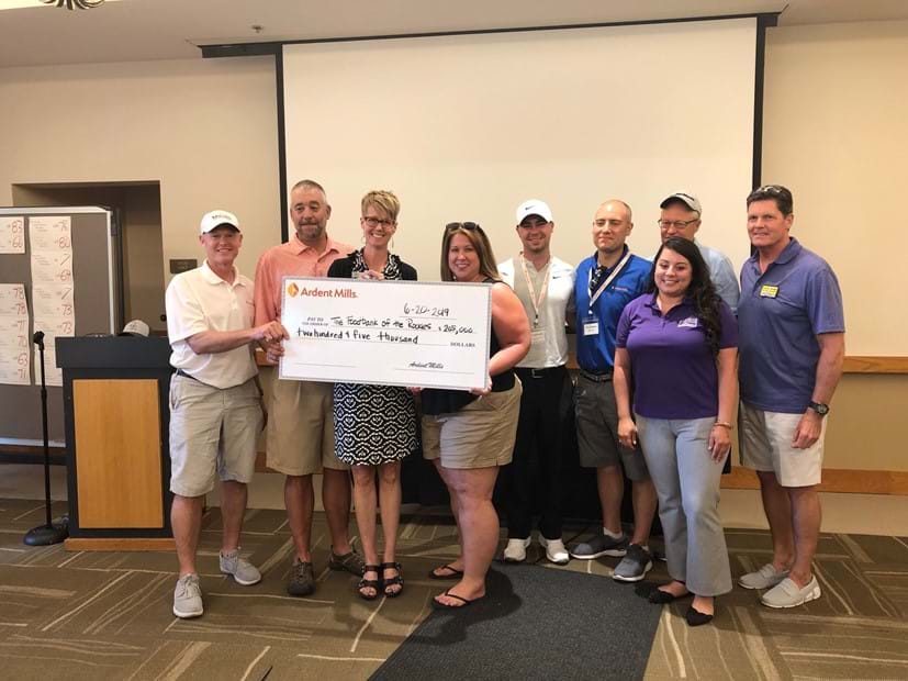 Teeing Up to Feed Hungry Families - Image